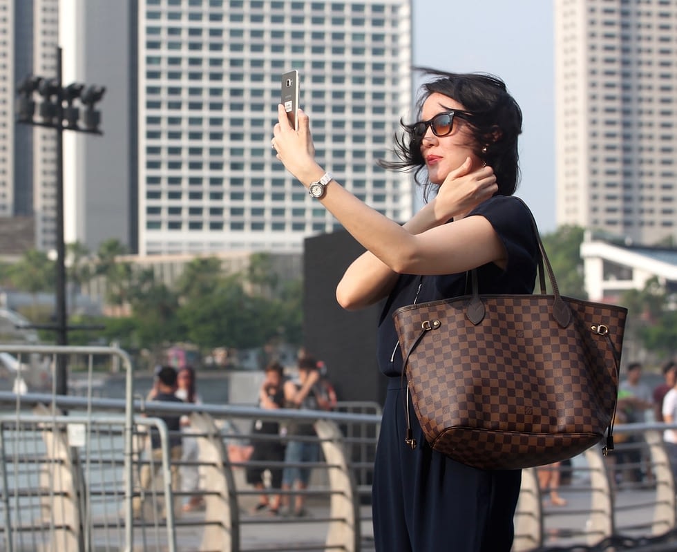 a woman taking a selfie